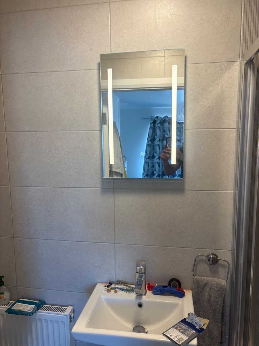 Illuminated bathroom mirror installation, Cork, after