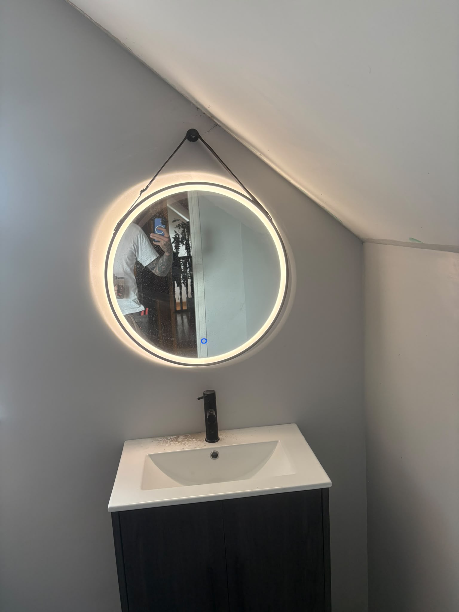 Illuminated round mirror installation, Cork