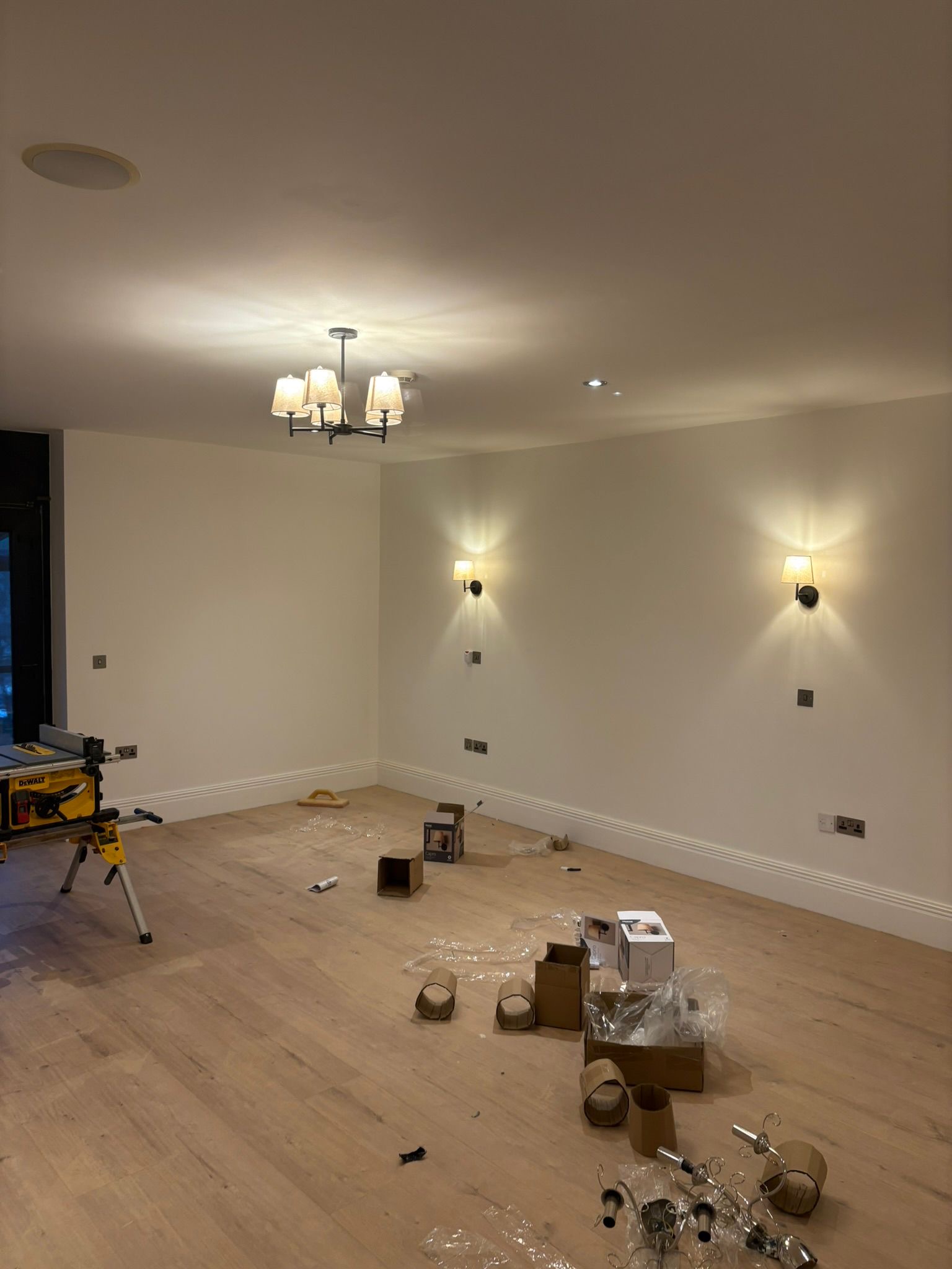 Living room chandelier and sconces, Cork