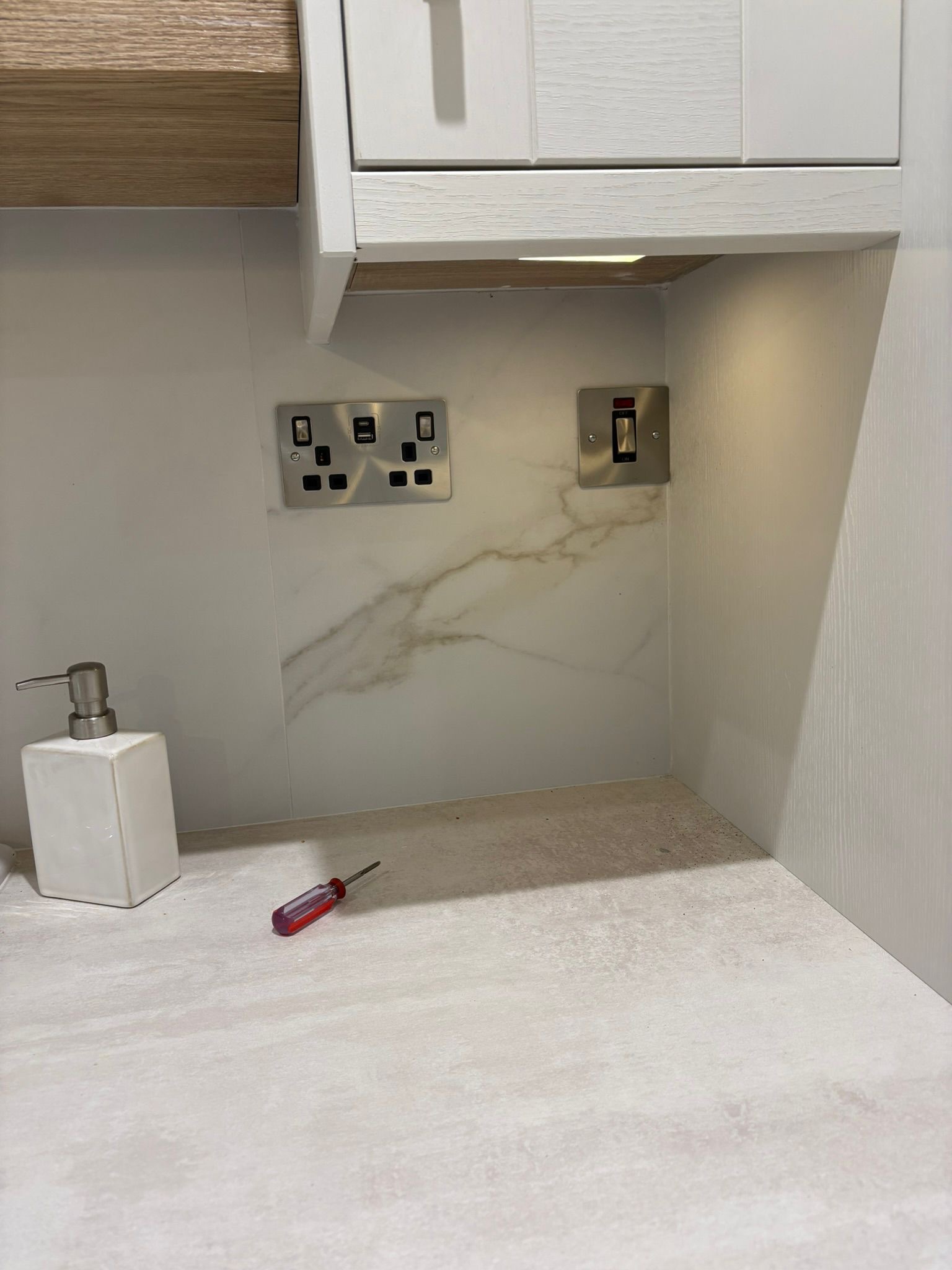 Kitchen sockets with marble splashback, Cork
